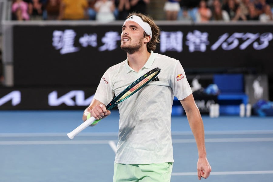 Greece's Stefanos Tsitsipas celebrates after victory against Australia's Jordan Thompson during their men's singles match on day four of the Australian Open tennis tournament in Melbourne. - AFP PIC