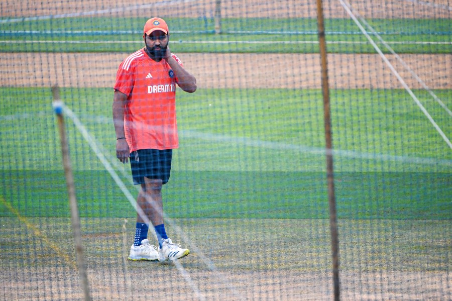 India’s Rohit Sharma inspects the pitch during a practice session at the Wankhede Cricket Stadium in Mumbai. - AFP PIC