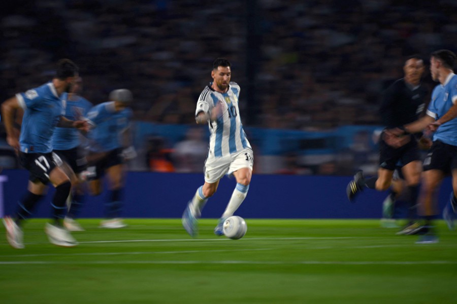 Argentina's forward Lionel Messi controls the ball during the match against Uruguay at La Bombonera stadium in Buenos Aires. - AFP PIC