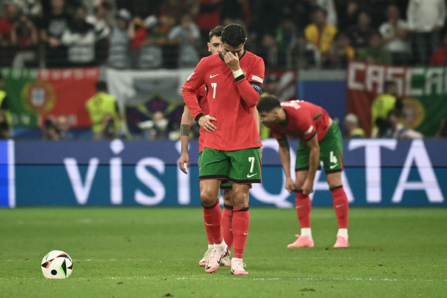 Portugal's forward Cristiano Ronaldo reacts after missing a penalty shot during the UEFA Euro 2024 round of 16 football match between Portugal and Slovenia at the Frankfurt Arena in Frankfurt. - AFP PIC