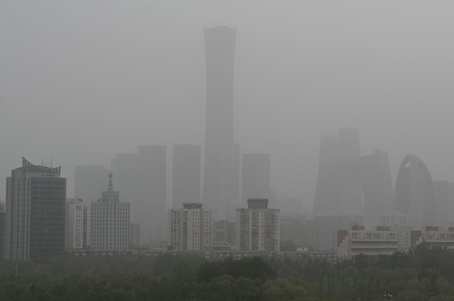 High rise buildings at central business district are seen on a severely polluted day in Beijing on April 12, 2023.- AFP PIC