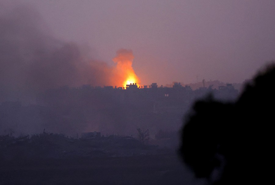 Fire burns after an explosion in north Gaza, as seen from southern Israel, amid the ongoing conflict between Israel and Hamas. - REUTERS PIC