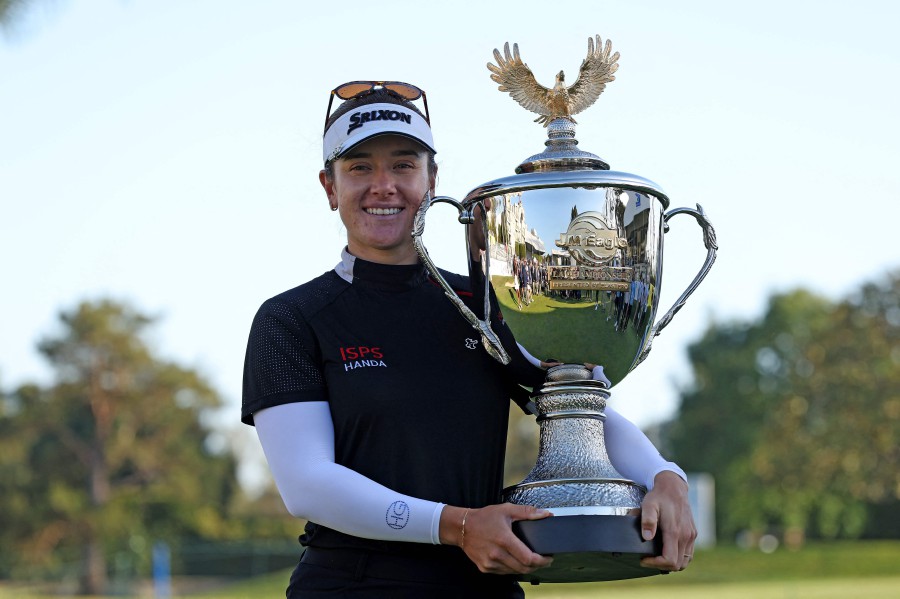 Hannah Green of Australia poses with the trophy after winning the JM Eagle LA Championship presented by Plastpro at Wilshire Country Club on April 28, 2024 in Los Angeles, California. - AFP PIC