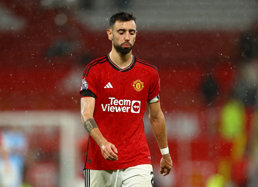 Manchester United's Bruno Fernandes looks dejected after the match against Manchester City at Old Trafford, Manchester. - REUTERS PIC