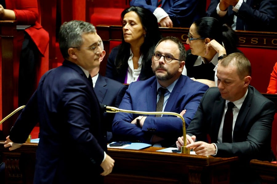 French Interior Minister Gerald Darmanin, Minister for Health and Prevention Aurelien Rousseau and Labour, Employment and Integration Minister Olivier Dussopt attend the questions to the government session at the National Assembly ahead of a vote by members of parliament on immigration bill in Paris, France. - REUTERS PIC