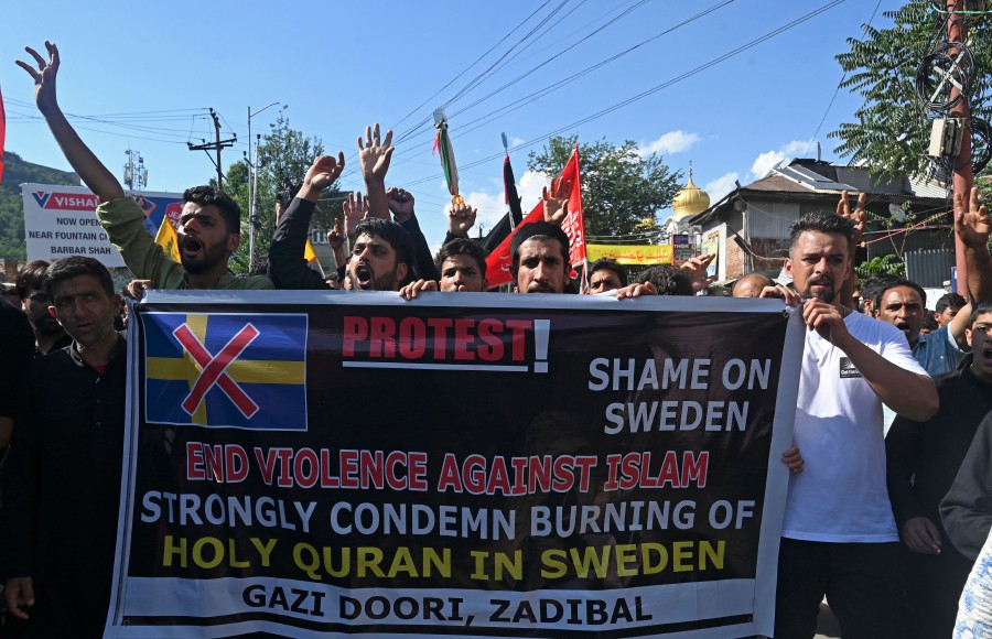 Kashmiri Muslims protest denouncing the burning of the Quran in  Sweden during a procession on the seventh day of Ashura during the Islamic month of Muharram, in Srinagar. - AFP PIC