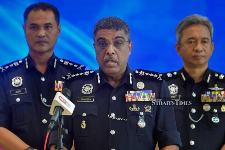 Kuala Lumpur police chief Datuk Allaudeen Abdul Majid (centre) speaking to reporters during a press conference at the Kuala Lumpur police headquarters. - BERNAMA PIC