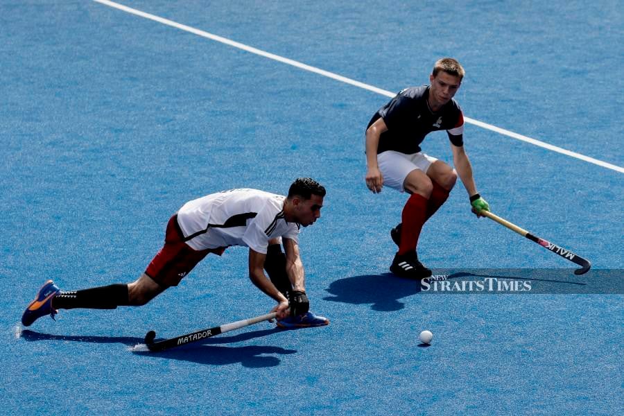 France’s Arthur Morcrette (right) in action during the match against Egypt at National Hockey Stadium in Bukit Jalil. -Pic courtesy of MHC
