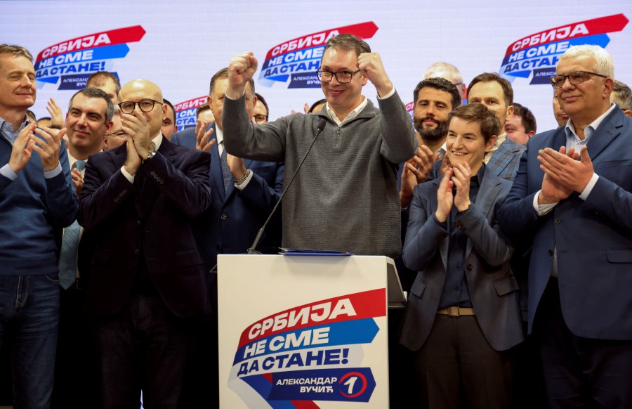 Serbian President Aleksandar Vucic gestures on stage at Serbian Progressive Party (SNS) headquarters following exit polls results of the parliamentary election in Belgrade, Serbia. - REUTERS PIC