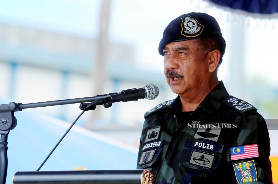 Inspector-General of Police (IGP) Tan Sri Razarudin Husain delivers his speech during the closing of the 2024 Internal Security and Public Order Department Mara Lasak Test at the General Operations Force Northern Brigade Base in Ulu Kinta. -NSTP/L.MANIMARAN 