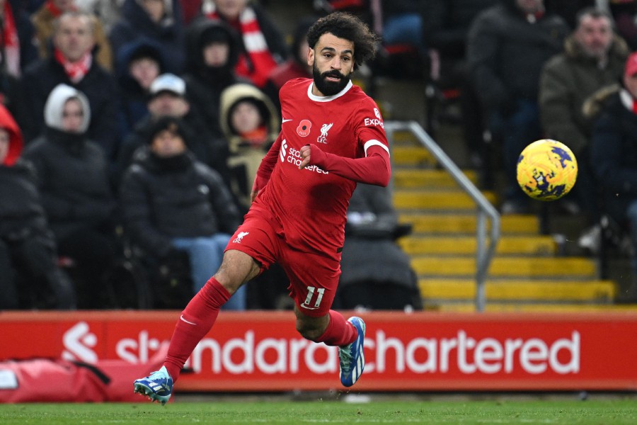 Liverpool Mohamed Salah runs with the ball during the match against Brentford at Anfield in Liverpool. - AFP PIC