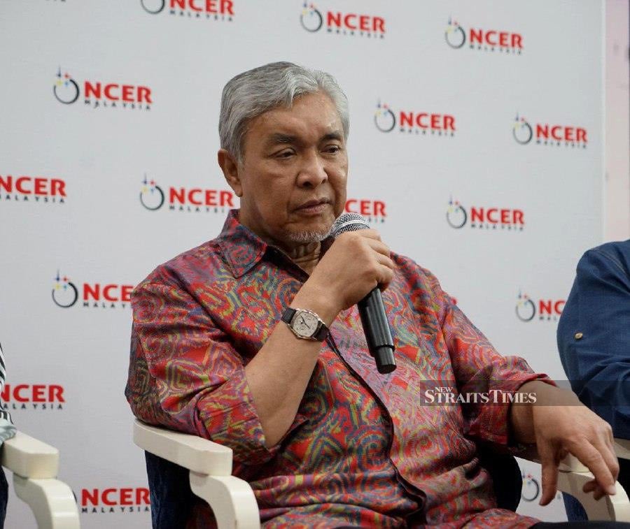 Deputy Prime Minister and Umno president Datuk Seri Dr Ahmad Zahid Hamidi speaks to the press after officiating a mini exhibition and handing over business kits to the Northern Corridor Implementation Authority (NCIA) at the Dato’ Lope Hashim Hall in Bagan Datuk. -NSTP/MUHAMAD LOKMAN KHAIRI.