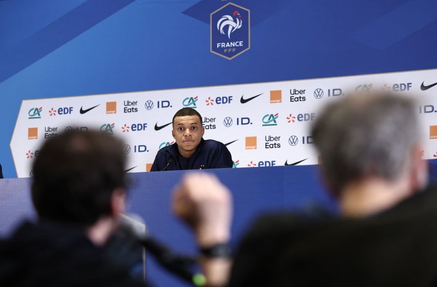 France's forward Kylian Mbappe holds a press conference in Marseille, southern France, on the eve of a friendly football match between France and Chile at the Velodrome stadium..-AFP PIC 