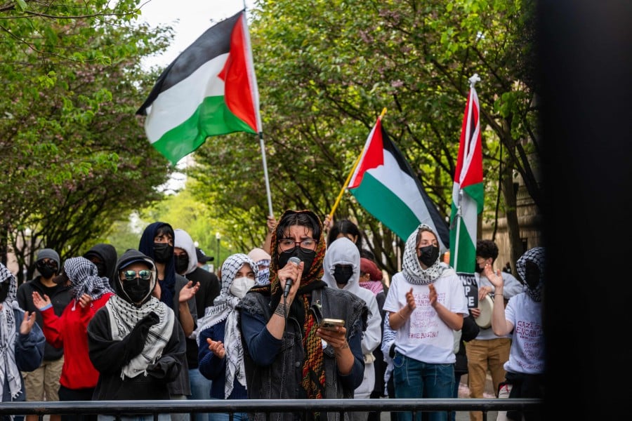 Pro-Palestinian supporters continue to demonstrate with a protest encampment on the campus of Columbia University on April 30, 2024 in New York City. - AFP PIC
