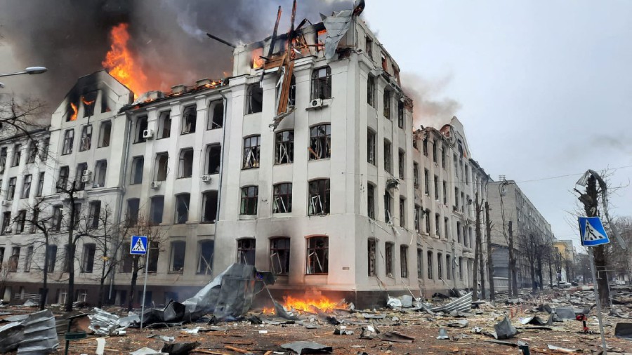 This handout picture released by the State Emergency Service of Ukraine, shows firefighters extinguishing a fire in the Kharkiv regional police department building, which is said was hit by recent shelling, in Kharkiv. - AFP PIC