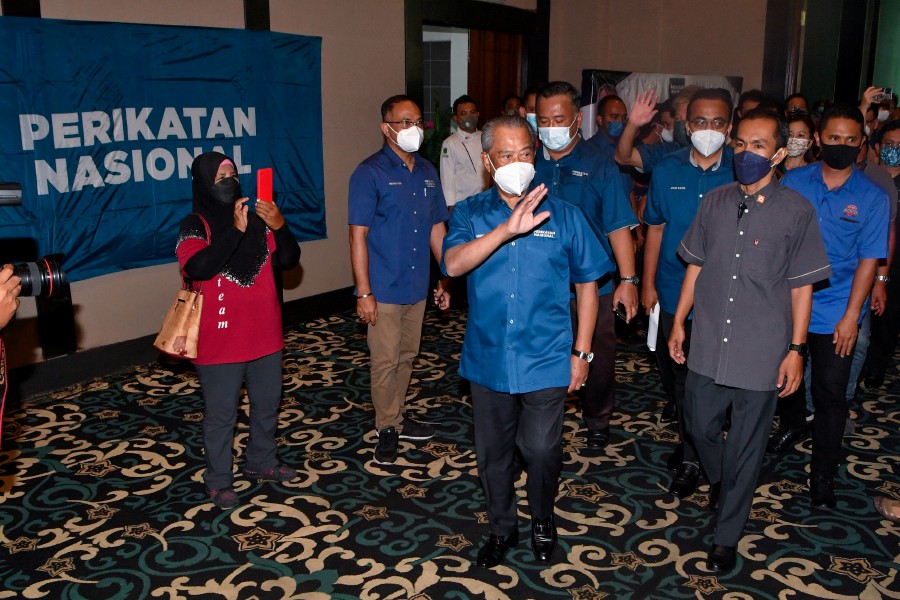Perikatan Nasional (PN) chairman Tan Sri Muhyiddin Yassin arrives for a lunch with state party members in Melaka. - BERNAMA PIC