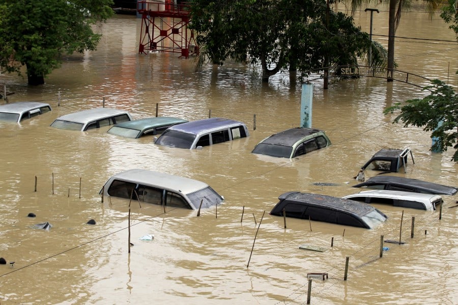 24,000 evacuated, two dead in Indonesian floods | New Straits Times ...