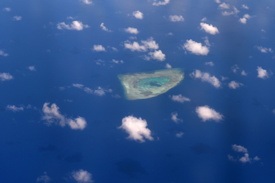 This file picture taken on April 21, 2017 shows an aerial view of a reef in the disputed Spratly islands. - AFP pic