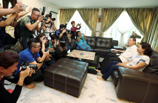 Penang Chief Minister Lim Guan Eng with wife Betty Chew pose for photos at their home in Jalan Pinhorn, Jelutong. Pix by MUHAMMAD MIKAIL ONG. 