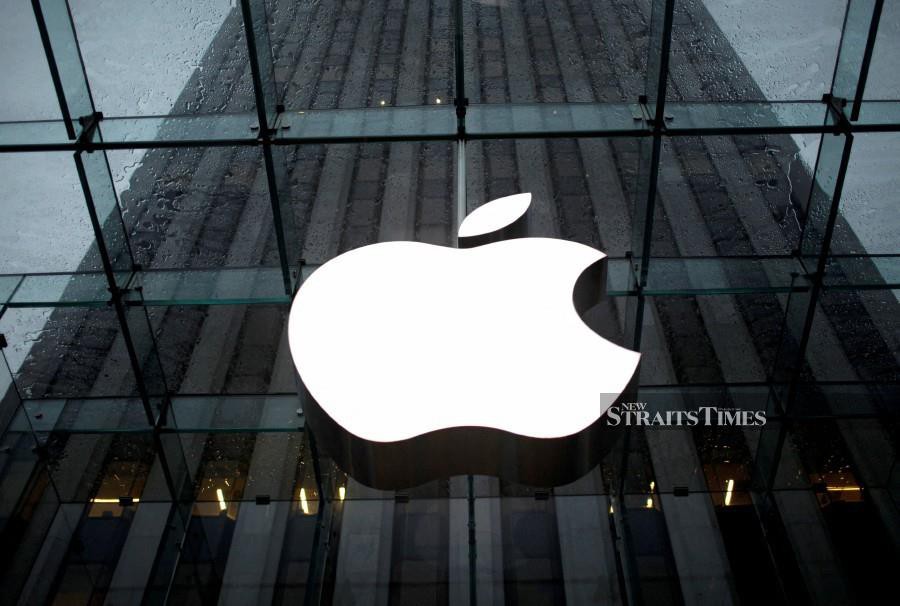 The Apple Inc. logo is seen in the lobby of Apple store. REUTERS/Mike Segar/File Photo