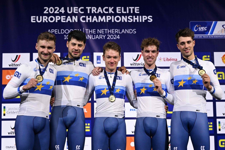 Britain's Daniel Bigham (L), Ethan Hayter (3rdL), Oliver Wood and Ethan Vernon (5thL) celebrate with gold medals on the podium for the Men's Team Pursuit finals during the second day of the UEC European Track Cycling Championships at the Omnisport indoor arena in Apeldoorn. AFP PIC