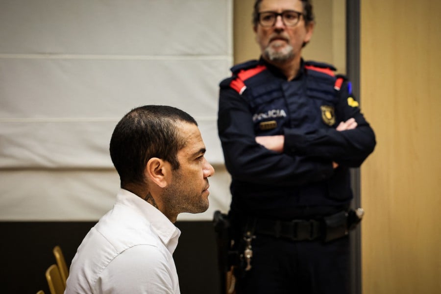Former Brazil international footballer Dani Alves, who is serving a four-and-a-half year sentence in Spain for rape, asked to be released on bail while his appeal is considered.- AFP PIC