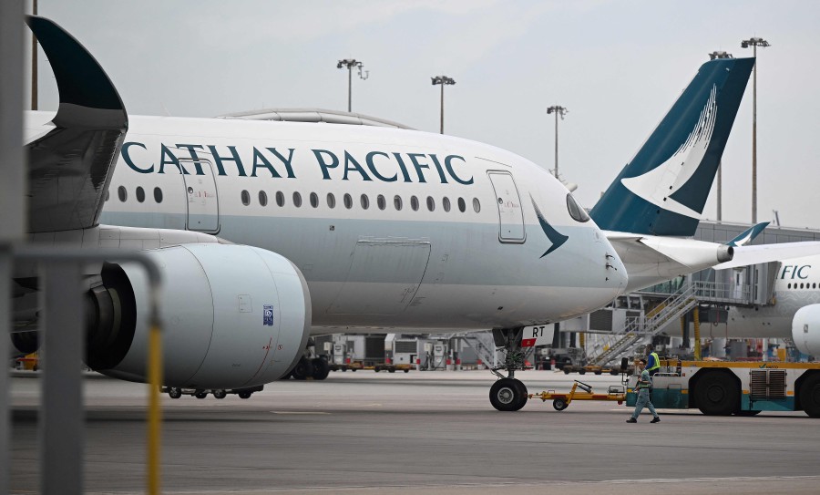 Cathay had earlier vowed to return to 100 percent pre-pandemic passenger flight levels by the end of 2024. - AFP PIC