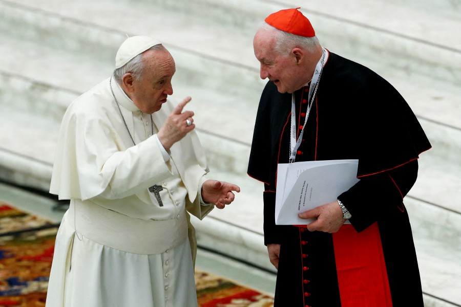  Pope Francis talks to Cardinal Marc Ouellet of Canada as he inaugurates the work of the International Symposium "For a fundamental theology of the priesthood" at the Vatican, February 17, 2022. - REUTERS PIC