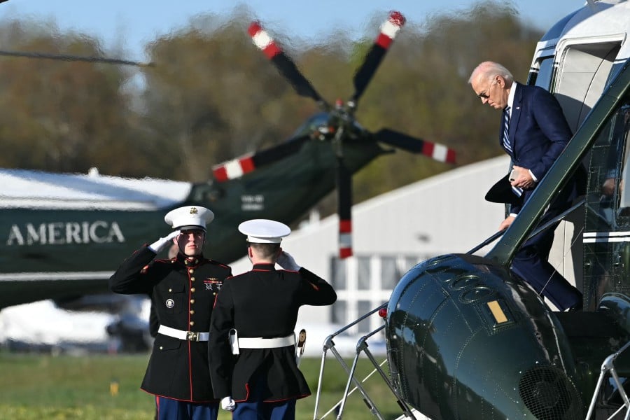 US President Joe Biden steps off Marine One upon arrival at Westchester County Airport in White Plains, New York. - AFP PIC