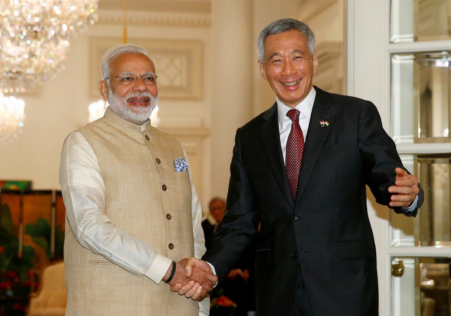  India's Prime Minister Narendra Modi meets Singapore's Prime Minister Lee Hsien Loong at the Istana in Singapore on June 1, 2018. -REUTERS FILE PIC