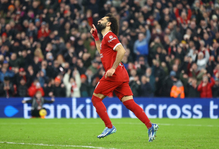 Liverpool's Mohamed Salah celebrates scoring their fourth goal against Newcastle United at Anfield, Liverpool. - REUTERS PIC