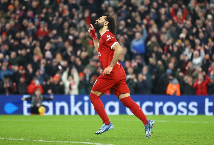 Liverpool's Mohamed Salah celebrates scoring their fourth goal against Newcastle United at Anfield, Liverpool. - REUTERS PIC