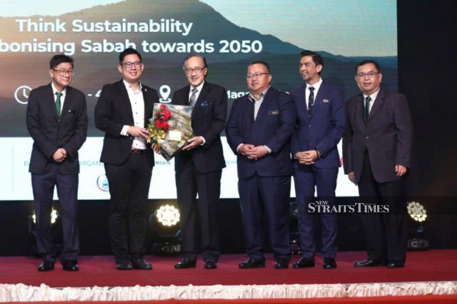 Sabah Finance Minister Datuk Seri Masidi Manjun (third left) during the launching of ESG Initiative For Sabah Forum at a hotel in Kota Kinabalu. -Pic courtesy of Invest Sabah