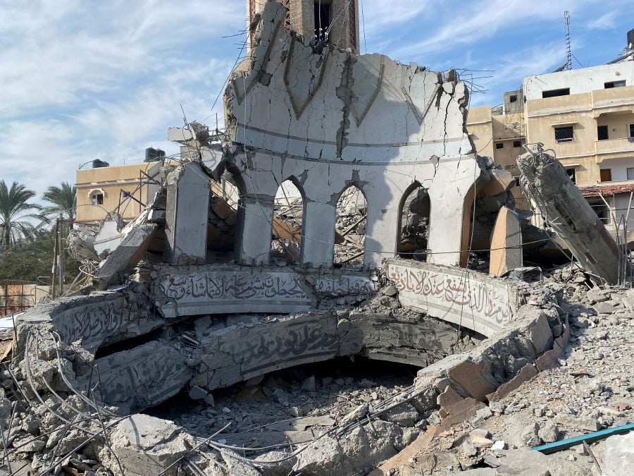 A view of the remains of a mosque destroyed by Israeli strikes, amid the ongoing conflict between Israel and Hamas, in the central Gaza Strip. - REUTERS PIC