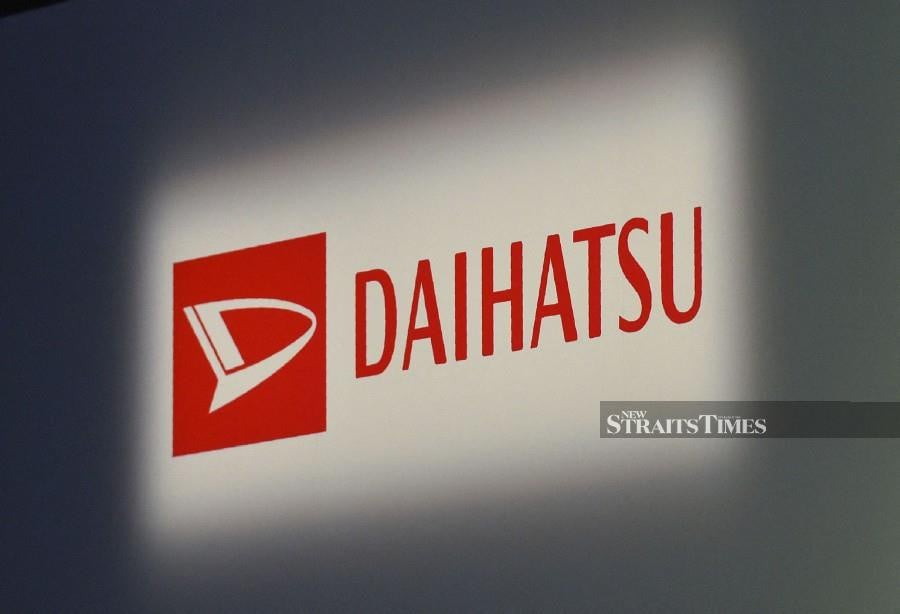 (FILES) This picture shows the logo of Daihatsu Motor displayed at a press conferene in Tokyo. (Photo by Kazuhiro NOGI / AFP)