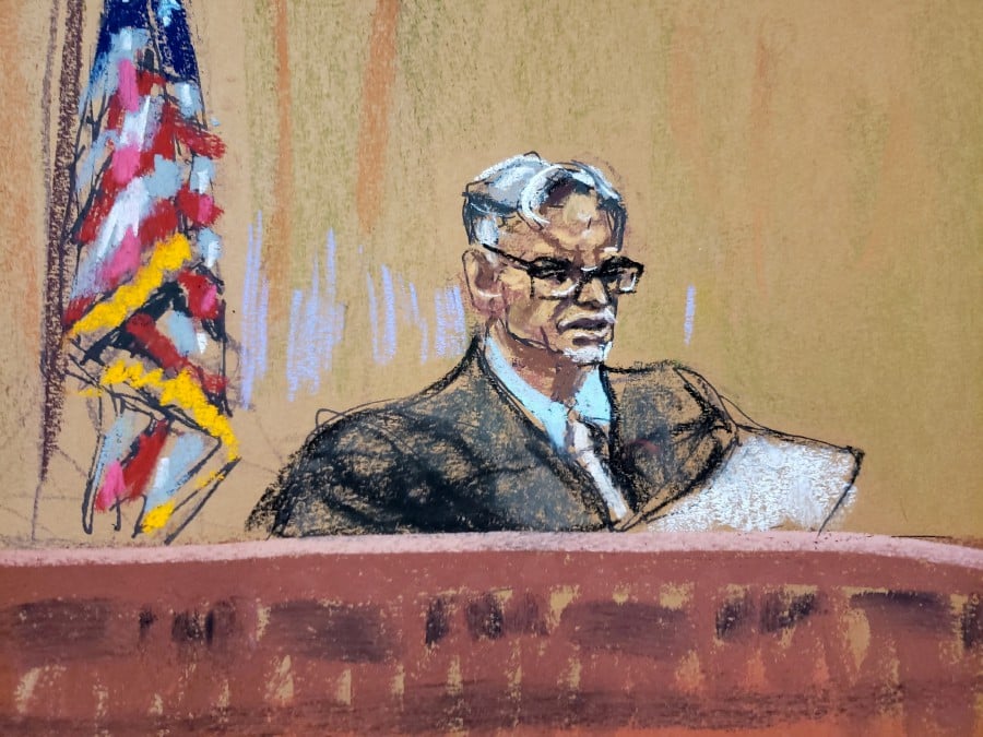Judge Juan Merchan re-reads counts in the charge as requested by a note from the jury during deliberations in the Trump Organization's criminal tax trial in Manhattan Criminal Court, New York City, U.S., December 6, 2022, in this courtroom sketch. - REUTERS PIC