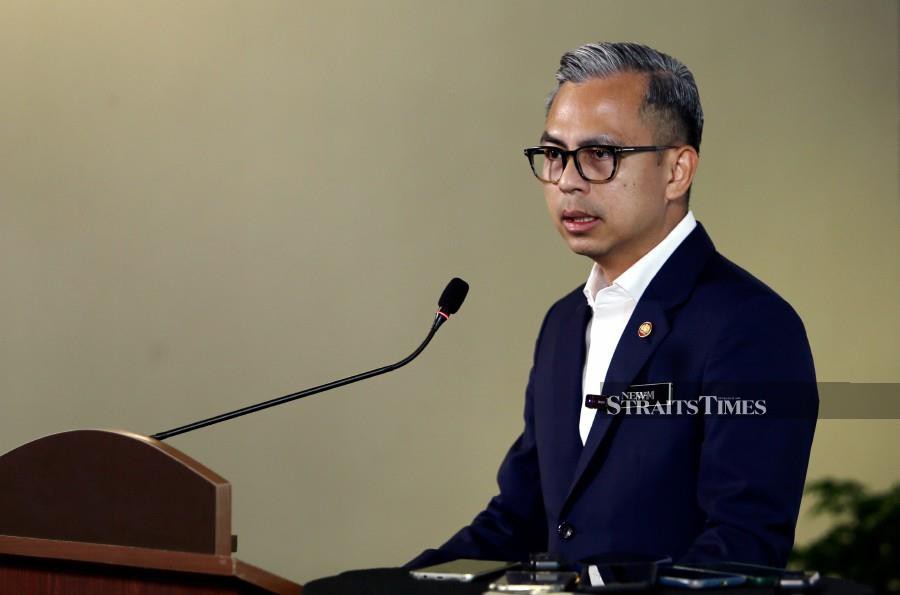Government spokesman and Communications Minister Fahmi Fadzil says two companies have been awarded 20-year contracts for the management of Kuala Lumpur Tower. NSTP/MOHD FADLI HAMZAH