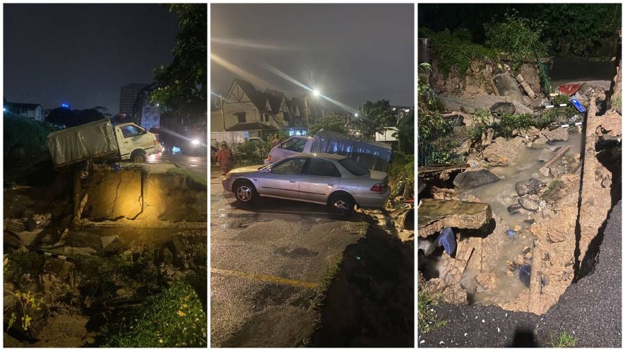 Two vehicles fell into a ditch after a landslide occurred in Taman Lembah Maju in Ampang today. - Pic courtesy of Bomba