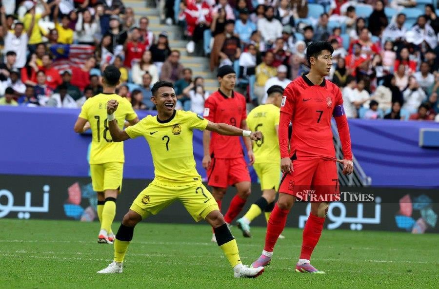 Malaysia’s Faisal Halim (left) celebrates after scoring the first goal against South Korea during the Qatar 2023 AFC Asian Cup Group E football match at Al-Janoub Stadium in al-Wakrah. -NSTP/HAIRUL ANUAR RAHIM