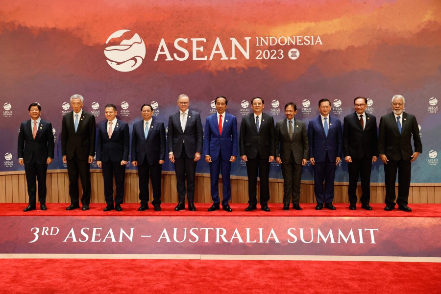 (L-R) Philippines' President Ferdinand Marcos Jr., Singapore's Prime Minister Lee Hsien Loong, Thailand's Permanent Secretary of the Ministry of Foreign Affairs Sarun Charoensuwan, Vietnam's Prime Minister Pham Minh Chinh, Australia's Prime Minister Anthony Albanese, Indonesian President Joko Widodo, Laos' Prime Minister Sonexay Siphandone, Brunei's Sultan Hassanal Bolkiah, Cambodia's Prime Minister Hun Manet, Prime Minister Datuk Seri Anwar Ibrahim and East Timor's Prime Minister Xanana Gusmao pose for a group photo during the Asean-Australia Summit as part of the 43rd ASEAN Summit in Jakarta. - AFP PIC