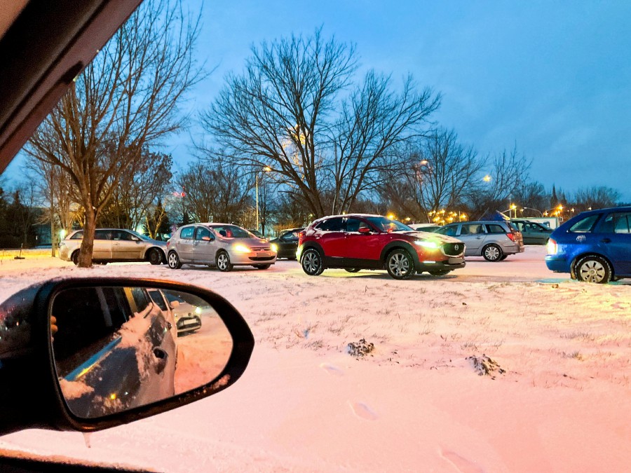 Drivers line up in their cars at the entrance of a drive-thru Covid-19 testing lab in Lodz, central Poland. - EPA PIC