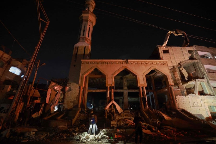 A destroyed mosque is seen following Israeli bombardments over Rafah in the southern Gaza Strip. - AFP PIC