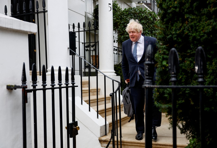 Former British Prime Minister Boris Johnson leaves his home, in London, Britain. - REUTERS PIC