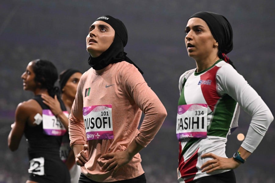 Afghan woman sprinter sends message of defiance at Asian Games