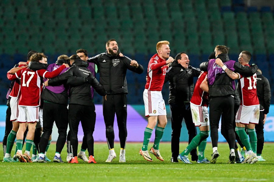 Hungary's midfielder Zsolt Kalmar (C-R) and teammates celebrate after Bulgaria scored an own goal during the UEFA Euro 2024 Group G qualification football match between Bulgaria and Hungary, at the Vassil Levski Stadium in Sofia. - AFP PIC
