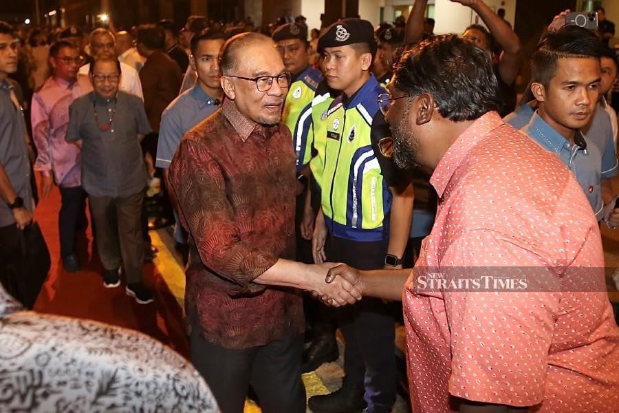 Prime Minister Datuk Seri Anwar Ibrahim arrives at the Kota Kinabalu International Airport, in Kota Kinabalu. - NSTP/MOHD ADAM ARININ