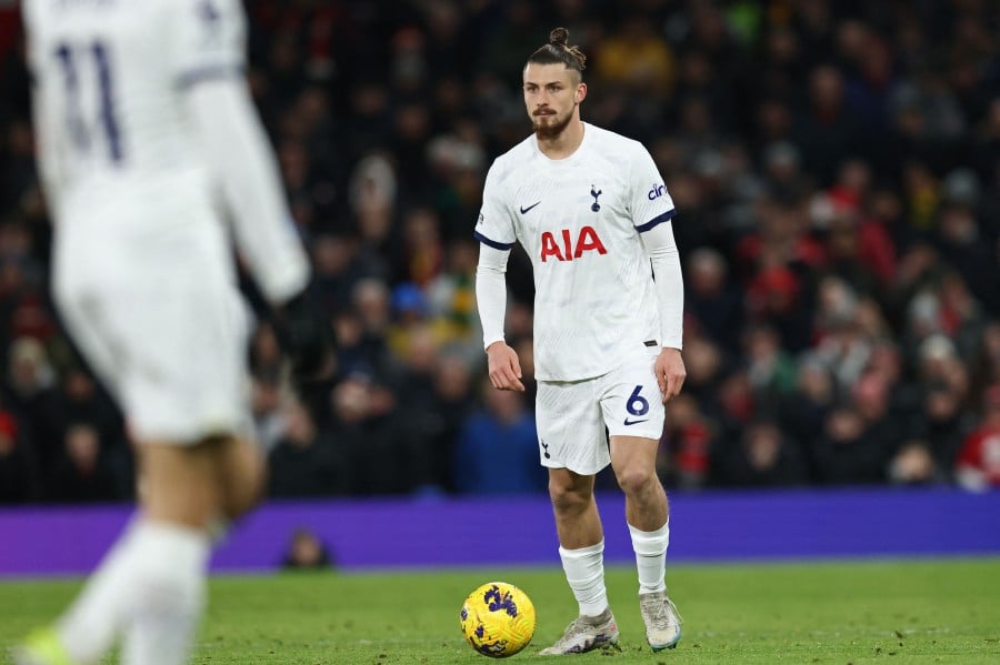 Tottenham Hotspur's Radu Dragusin makes his debut during the match against Manchester United at Old Trafford in Manchester, on January 14, 2024.- AFP PIC
