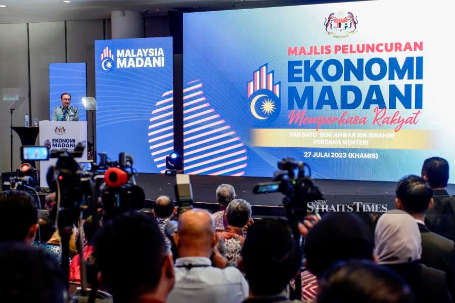 Prime Minister Datuk Seri Anwar Ibrahim speaks during the unveiling of the “Madani Economy: Empowering the People” framework in Bukit Kiara. -NSTP/AIZUDDIN SAAD