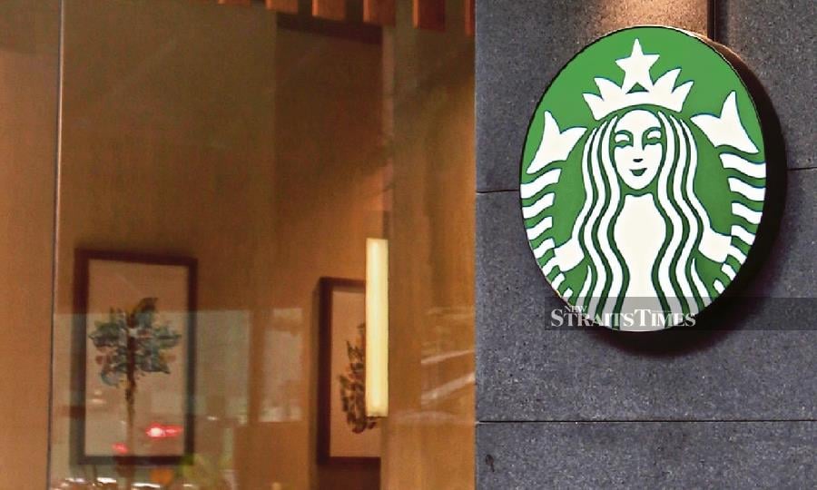 Starbucks closed at US$17.88 below its 52-week high of US$115.48, reached on May 1, indicating a more prolonged and sustained decline. - NSTP file pic