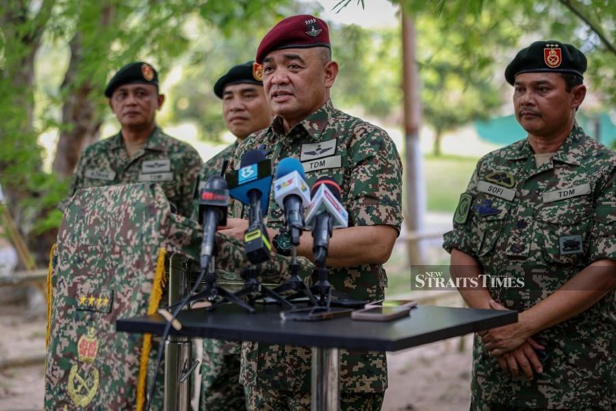 Army chief Gen Tan Sri Muhammad Hafizuddeain Jantan delivers his press conference during the Hari Raya Aidilfitri celebration event with operations officers and staff at Gubir Camp in Sik. - BERNAMA PIC